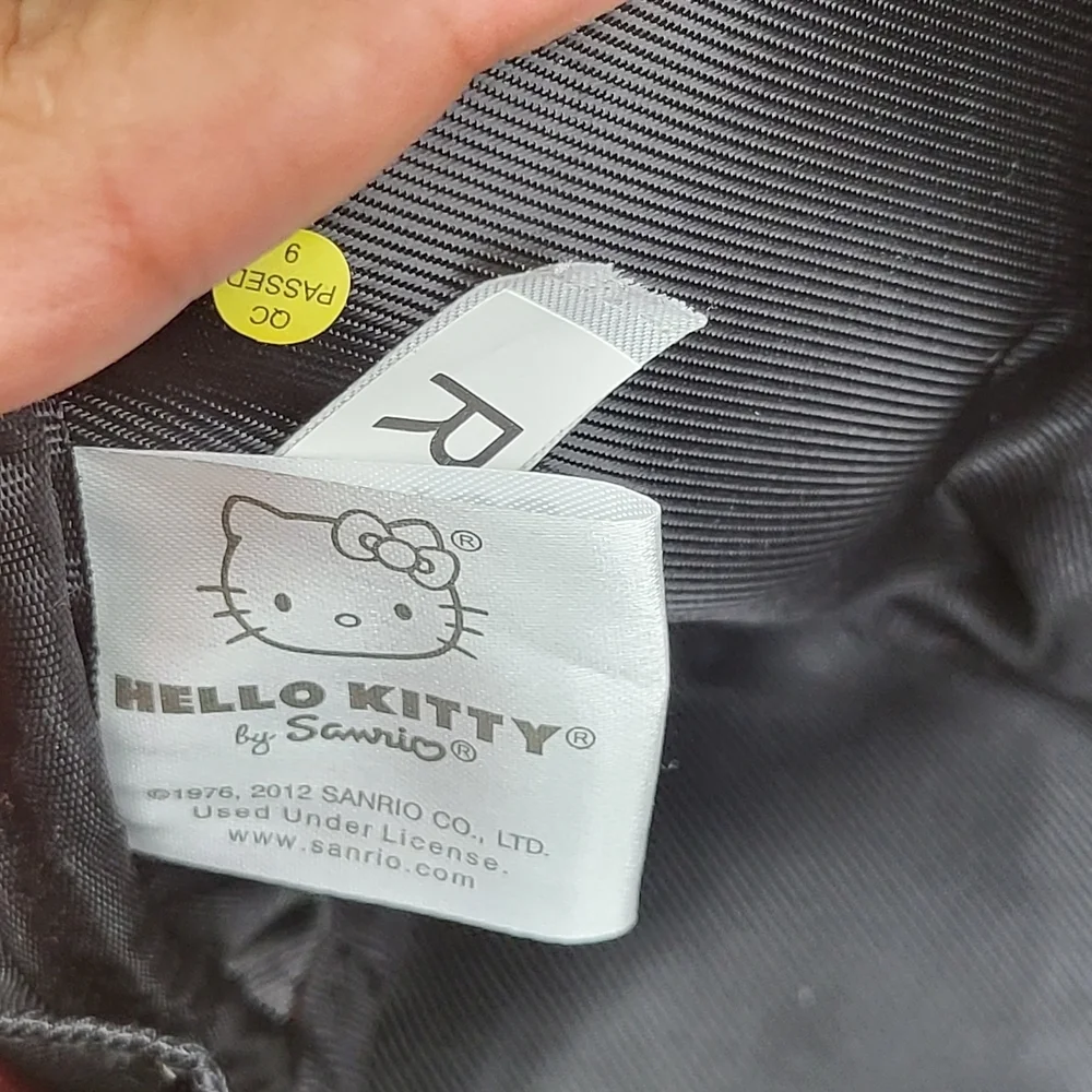 Hello Kitty Red Embossed Satchel with Character Charms..Original..GM size...